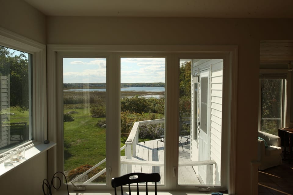 View of the porch and the Pool from TV/lounge area