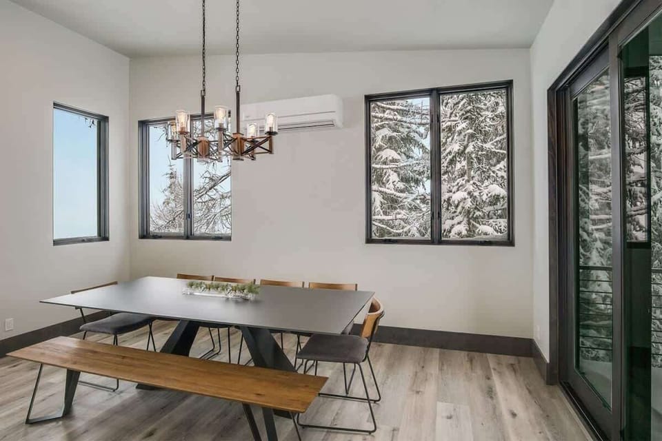 Dining area with electric BBQ just outside deck to the right