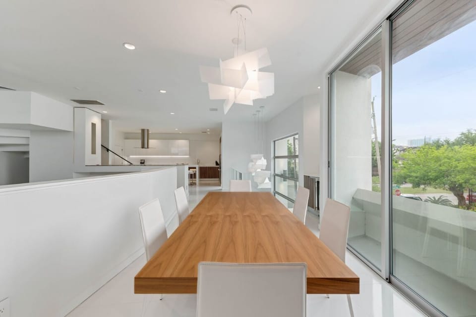Dining table with a view of the quiet residential street.