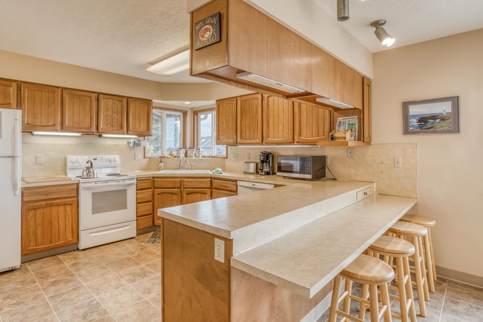Kitchen with high chairs`