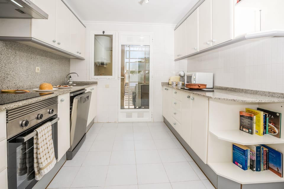 Kitchen has a seperate laundry area with washing machine