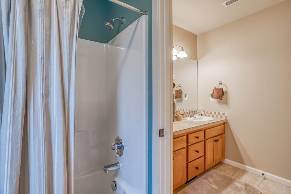 Hallway Bathroom with Bath Tub