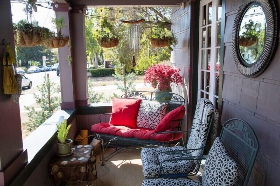 Cozy front porch to hang and watch the world go by.