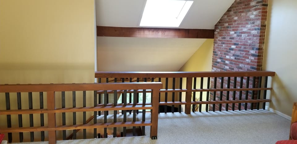 Custom enclosed loft and stairway for child safety.  