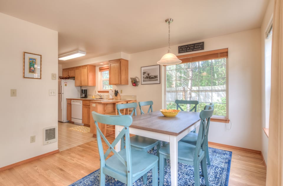 Floor 1 Dining Area with Kitchen Views