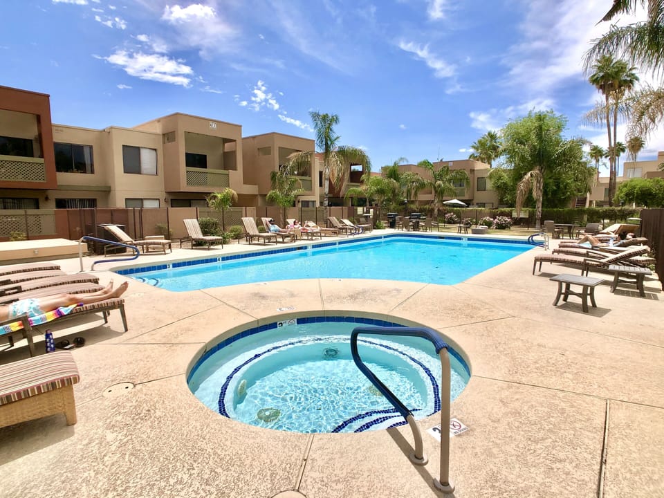 1 of 2 resort-style heated pools and hot tubs. Great for laps or lounging.