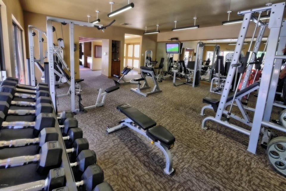 Expansive community fitness center. Ideal for maintaining a fitness routine.