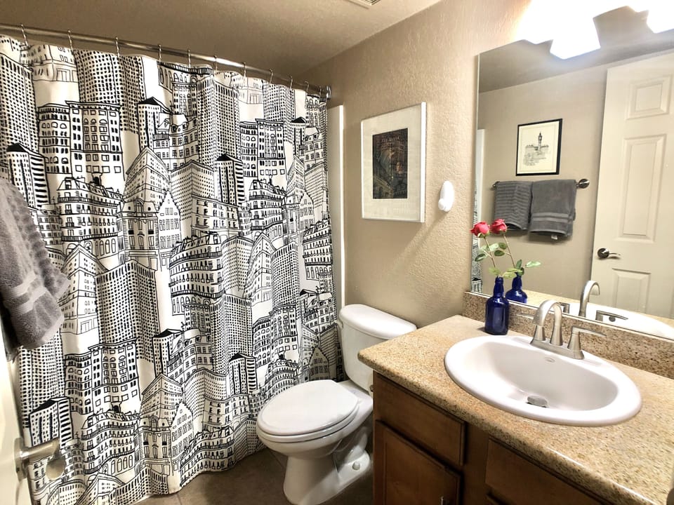 Hallway full bathroom. Essential for 2nd bedroom or guest use.