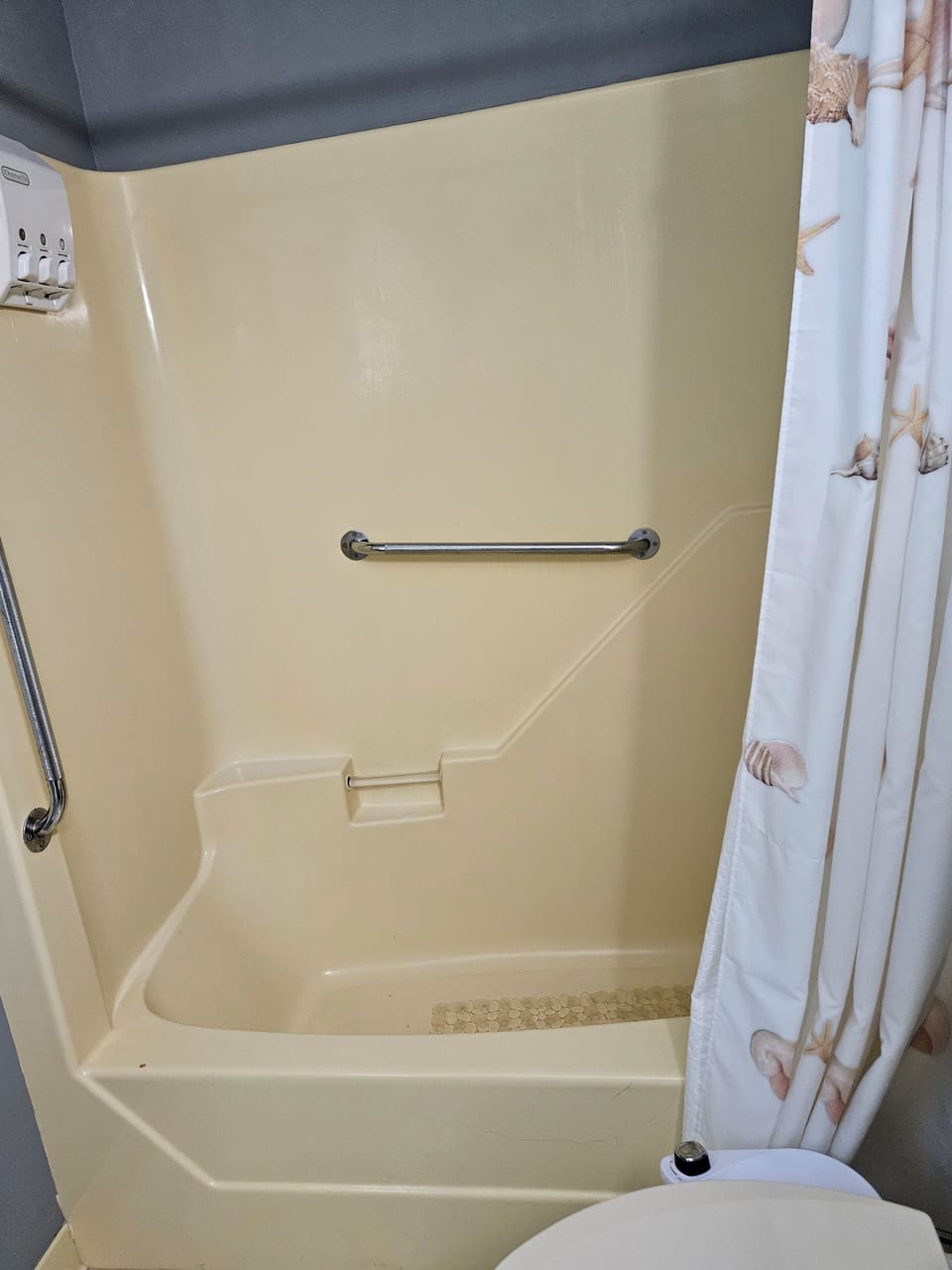 Handicap rails for easy shower and tub access.
