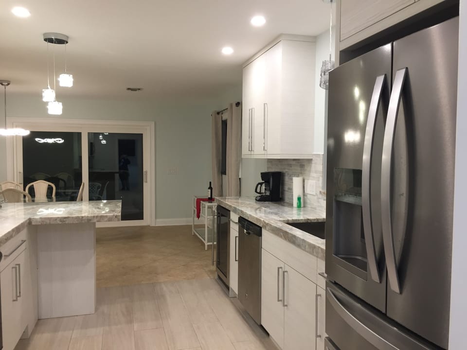 Granite kitchen includes wine cooler