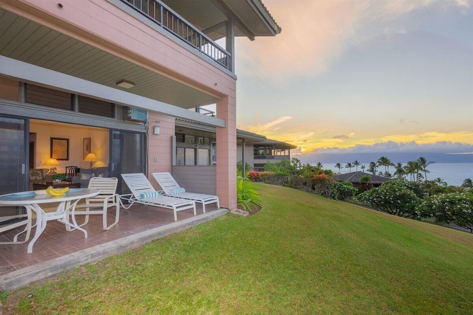 The lanai offers the perfect spot to relax with a Mai Tai as the sun melts into the Pacific
