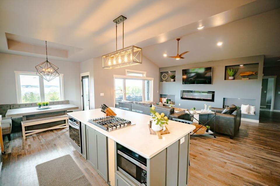 Kitchen island with living room and dining room
