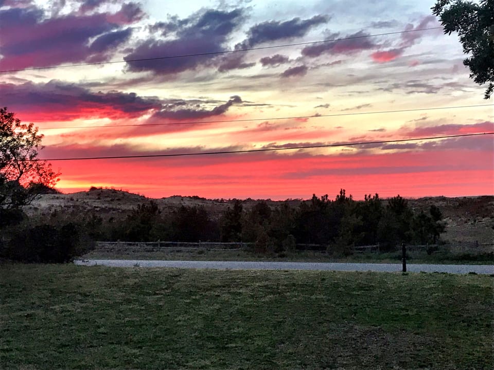 Experience spectacular sunsets from the front porch rockers every evening. 
