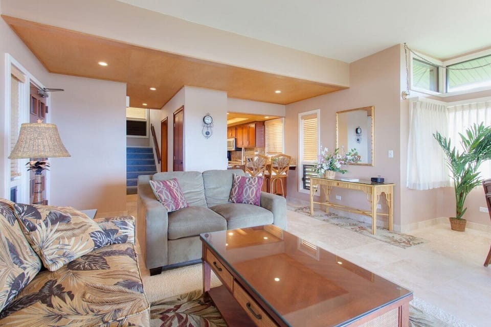 Spacious townhouse features spacious floor plan with wall of windows on two sides for lots of light