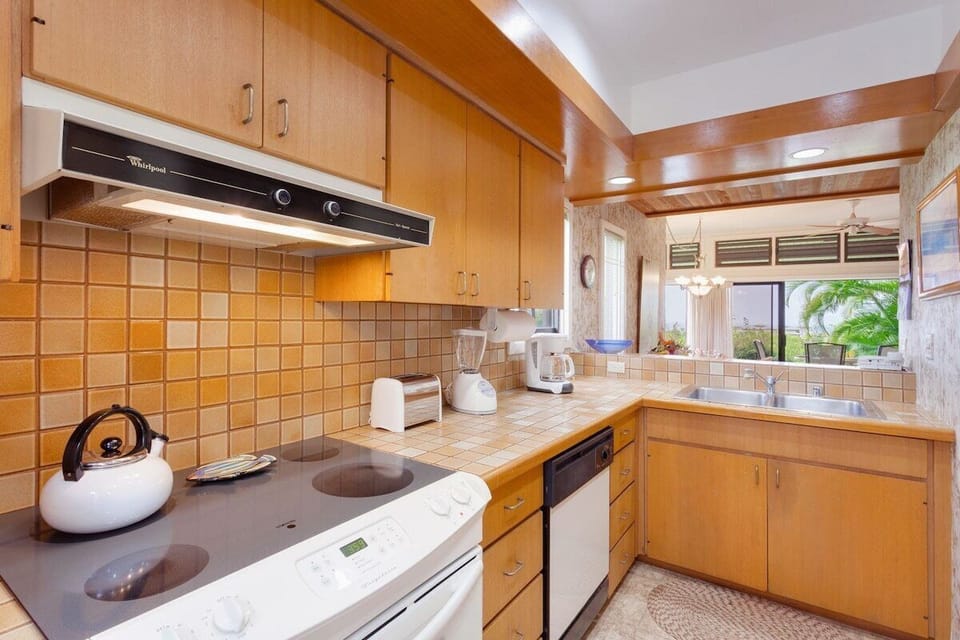 The kitchen in is fully stocked with all the comforts of home