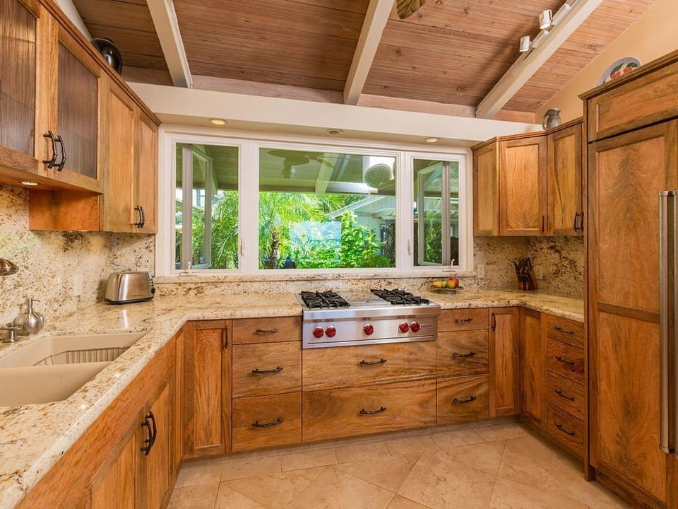 Indoor Gas stove, lots of counter space and gorgeous mango wood cabinetry