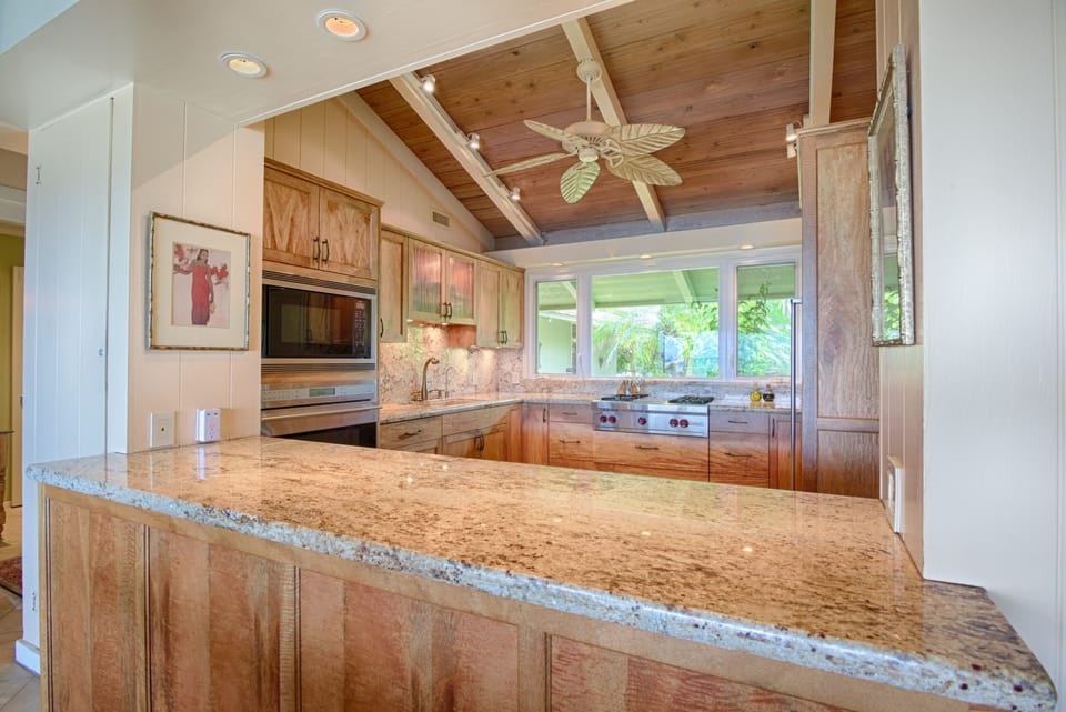 View into kitchen from Dining Room. Kitchen renovated w all high end appliances