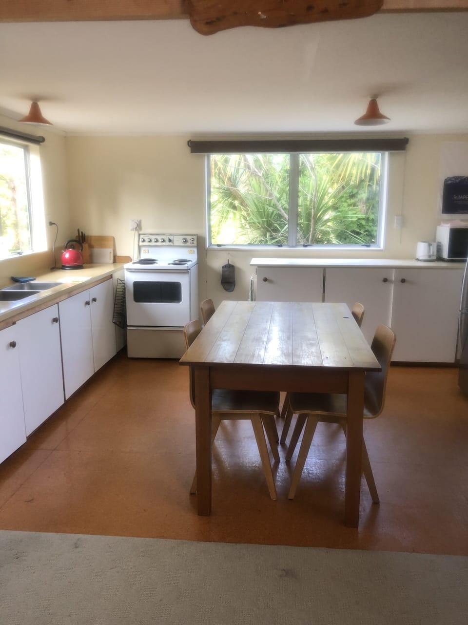 Kitchen: old range, microwave, sandwich press, toaster, lots to cook & eat with.