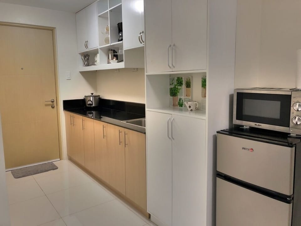 Lake View Condo at Wind Residences
