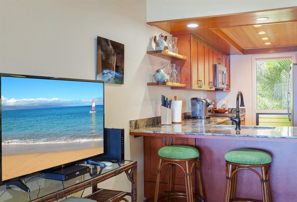 Indulge in your favorite shows on the large, flat screen TV