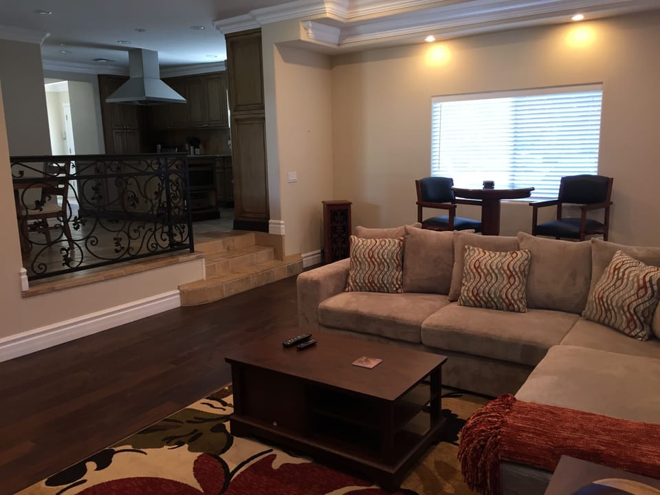 Inviting den with lots of sitting space for all!