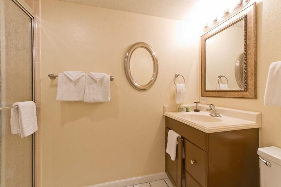 Full bathroom featuring a walk-in shower.
