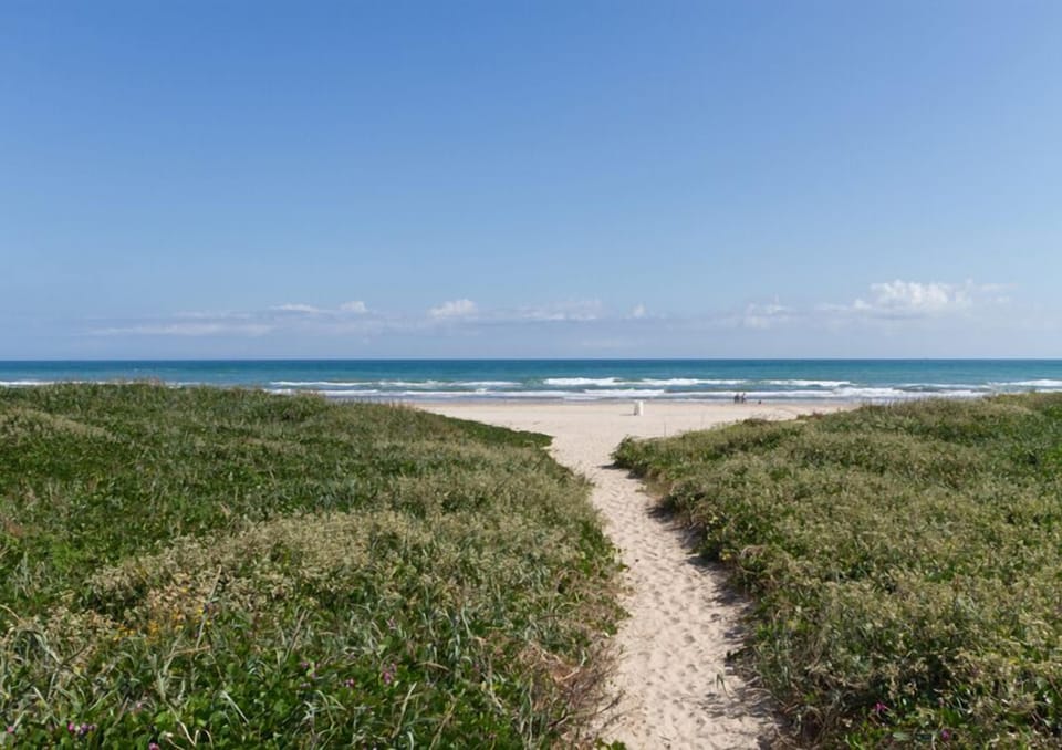 The private community beach access makes it easy to spend the day on the sand.