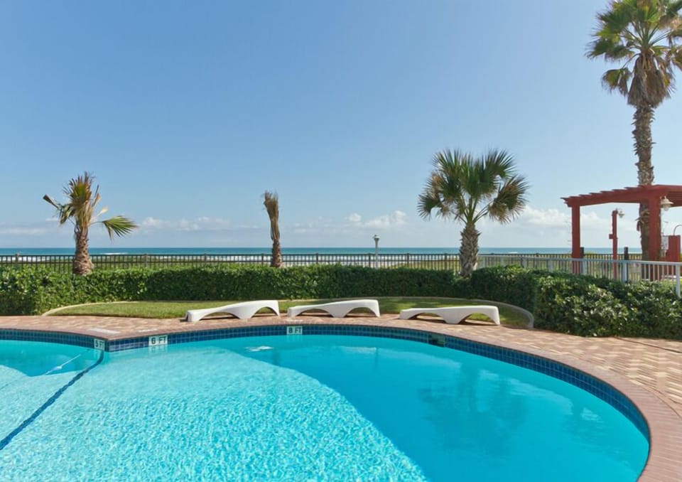 Lounge poolside while enjoying beautiful Gulf views just steps from the beach.