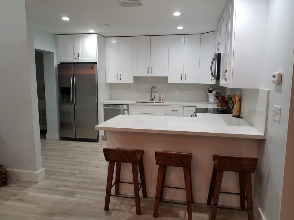 upstairs kitchen with counter seating 