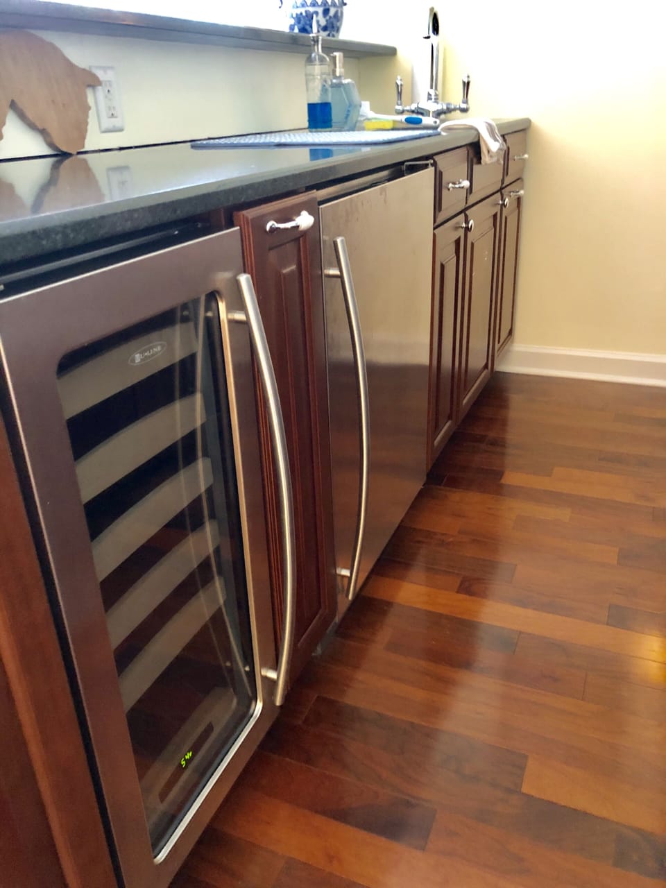Kitchenette downstairs with wine fridge + mini fridge