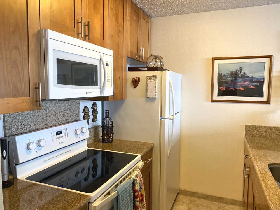 Glass top stove and microwave. 
New dinnerware, silverware, pots & pans etc. 