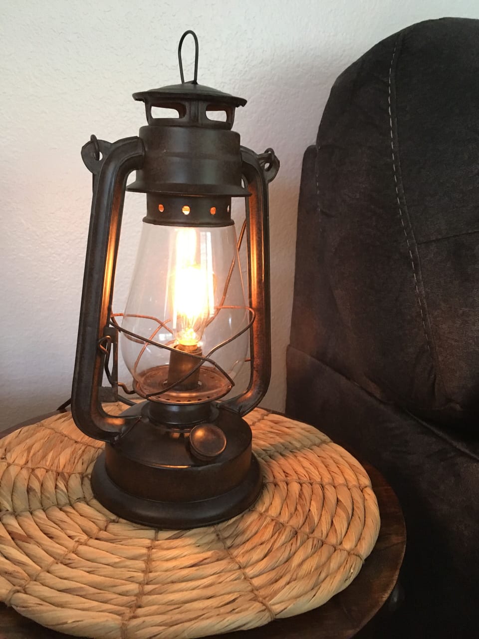 The soothing glow of a farmhouse lantern welcomes late arrivals.