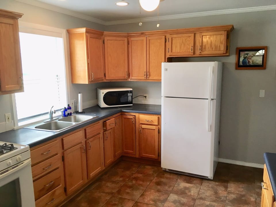 Fully stocked full-size kitchen