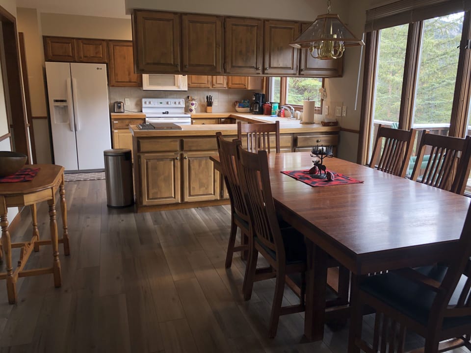 New Flooring in dining room, kitchen, den and laundry