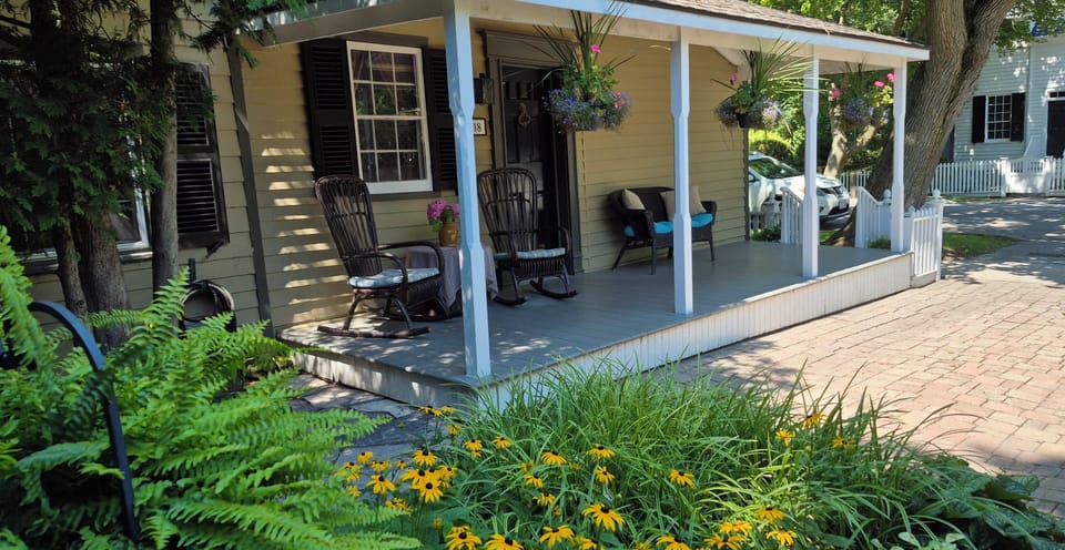 Wonderful porch! Listen to a sound of the past as the horses clip clop by.