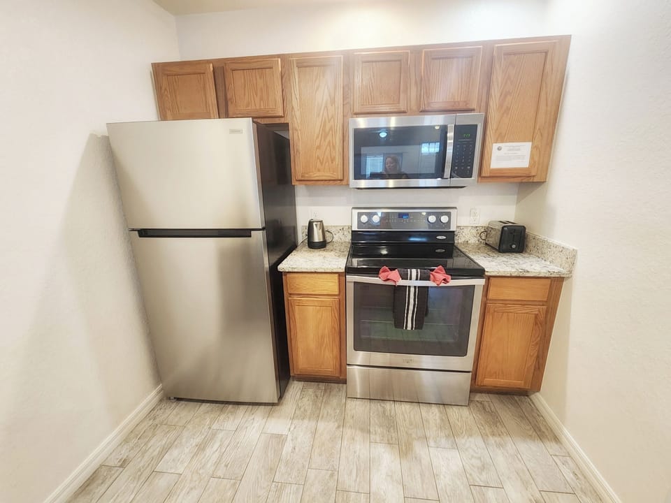 Fully Equipped Kitchen with Stainless Stee Appliances