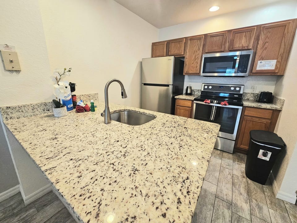 Fully Equipped Kitchen with Granite Counter Tops