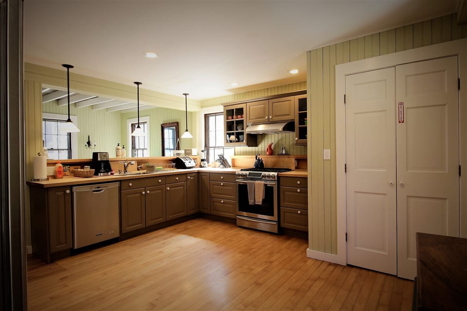 Kitchen with gas range has everything you need for preparing a feast.
