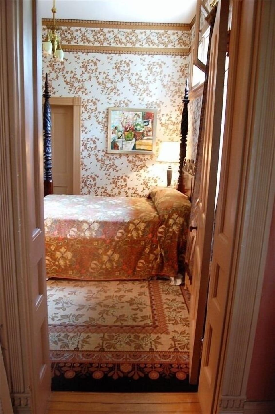 In the 1st-floor bedroom, Arts & Crafts patterns create a rich, but light look.