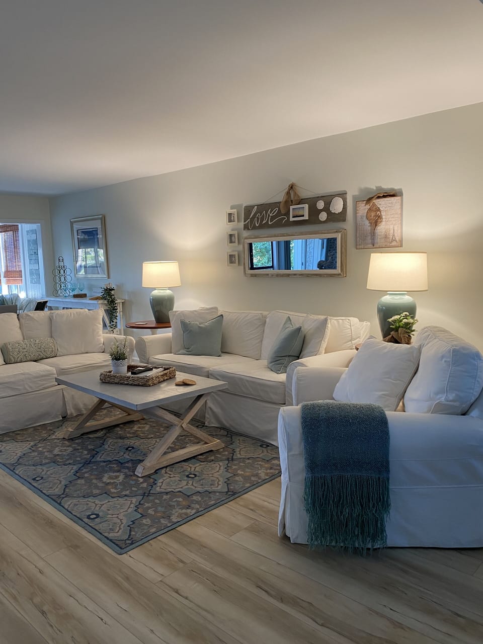Bright and open with lots of cozy seating! One story in a freestanding cottage.