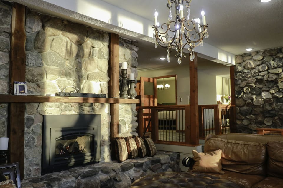 'The Great Gatsby' view of the stone fireplace.