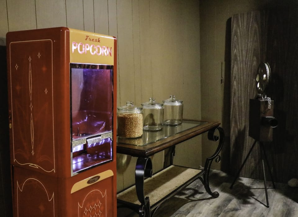 'The Shakespeare Globe Theater' with complementary popcorn and candy. 