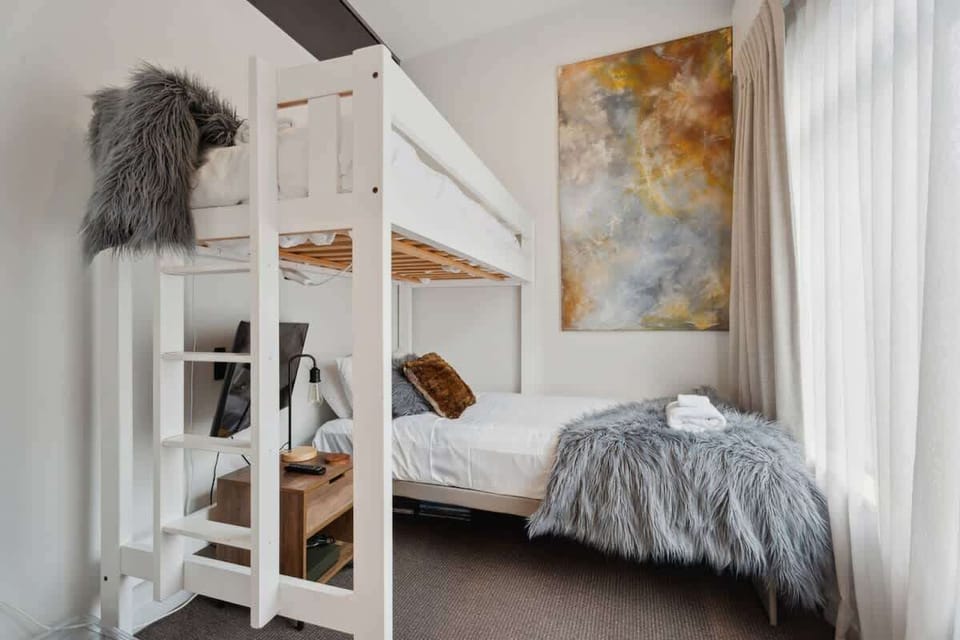 Bedroom 3 - upper level next to kitchen and living space 