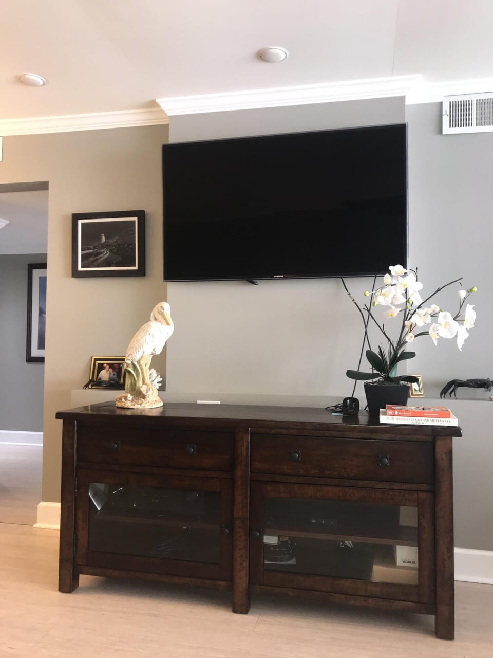 Family entertainment center has large flatscreen cable TV with Smarthub