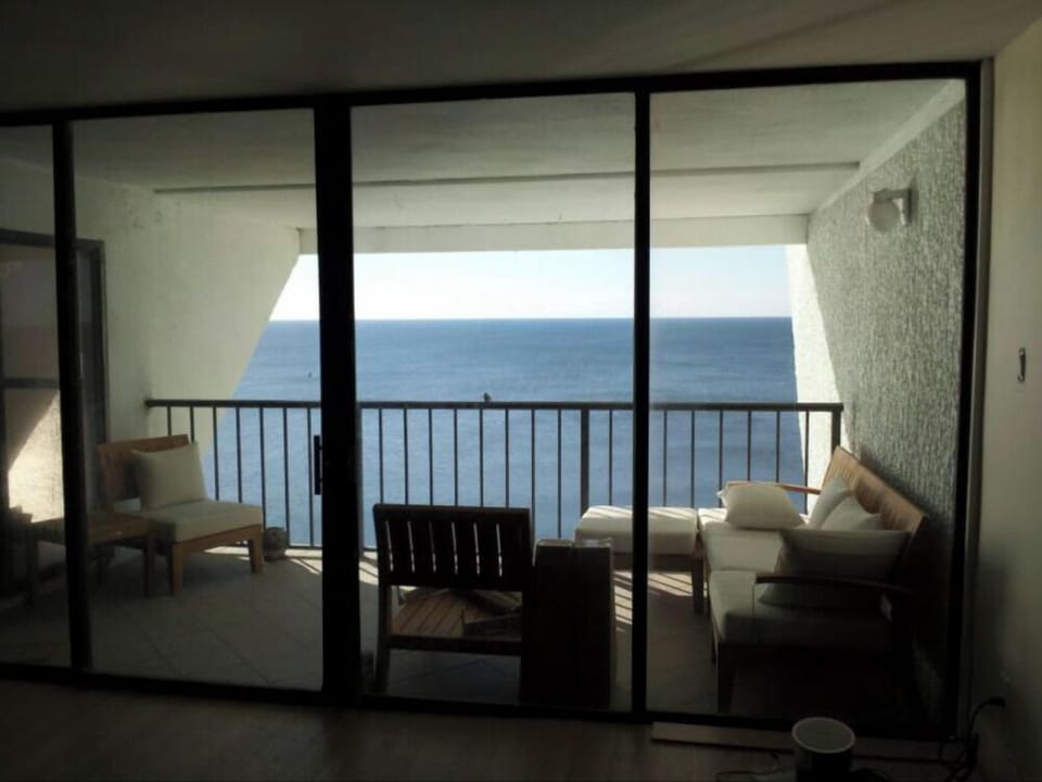 Unobstructed ocean views. Covered balcony to enjoy views even when storming.