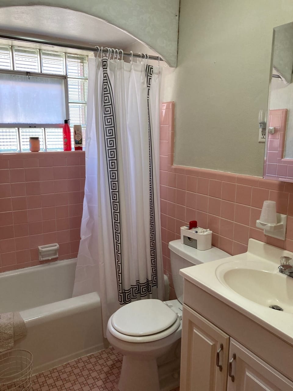 :Authentic 50"s" pink tile bathroom with glass block window