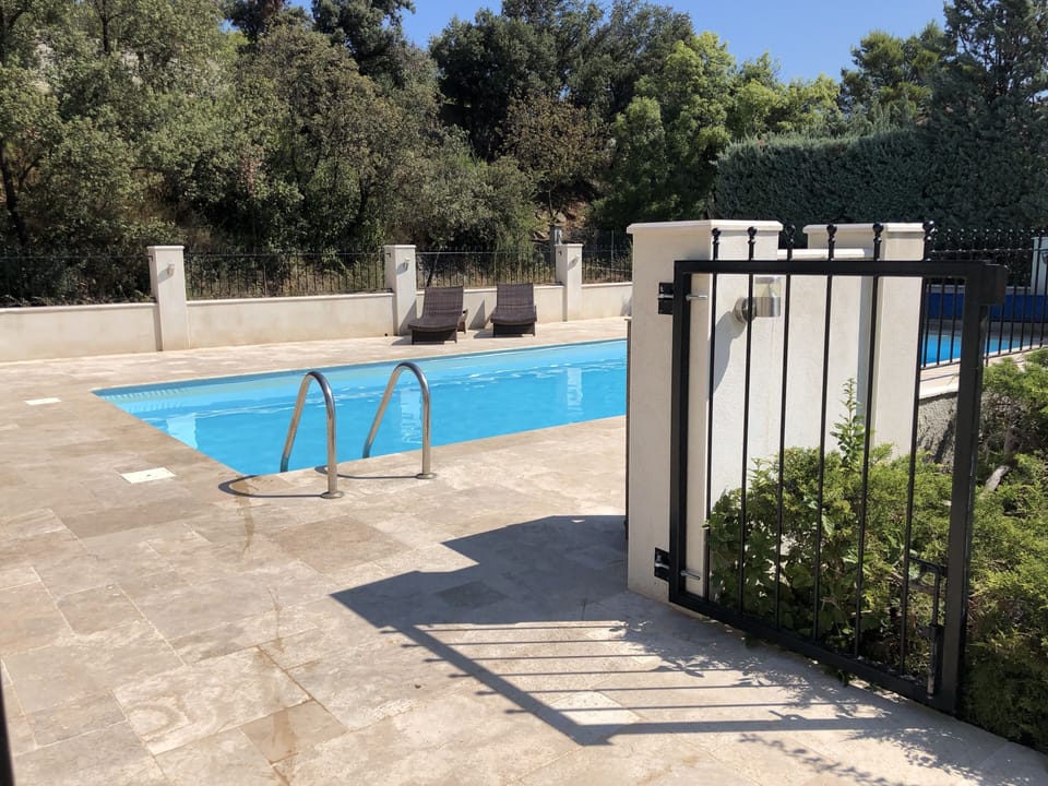 Double gate entrance to the pool 