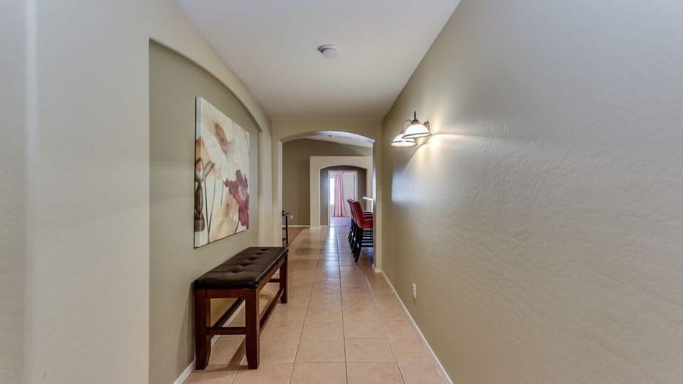 Hallway looking towards the entrance of the great room (Kitchen and Family room)