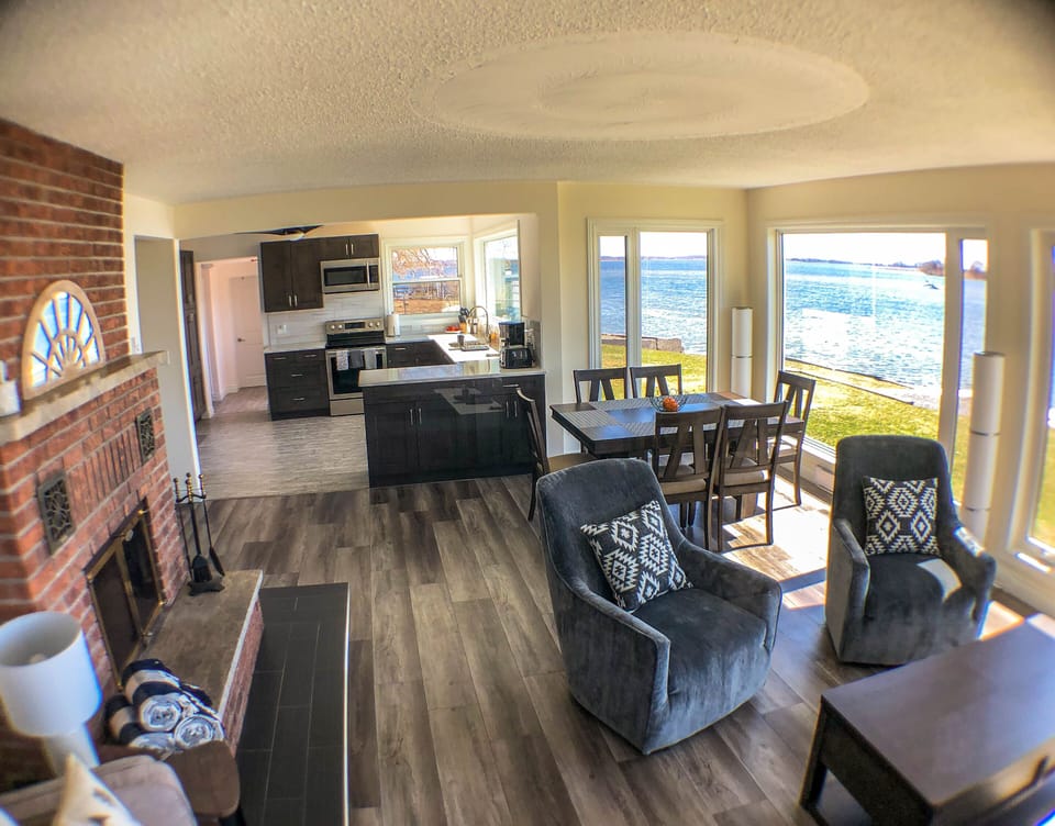 Fully equipped kitchen with clear line of sight to dining and living areas