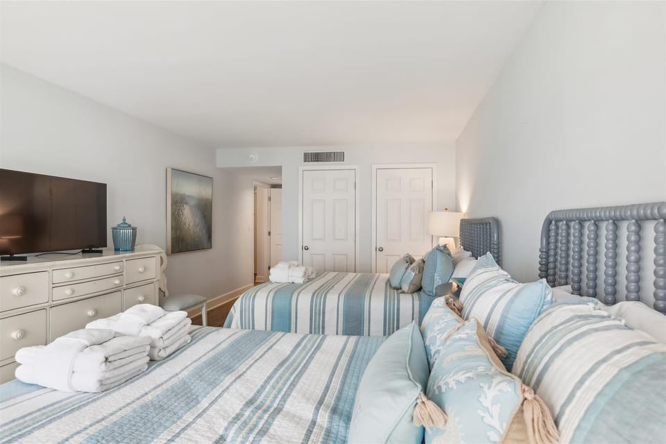 Guest Bedroom at 1883 Beachside Tennis
